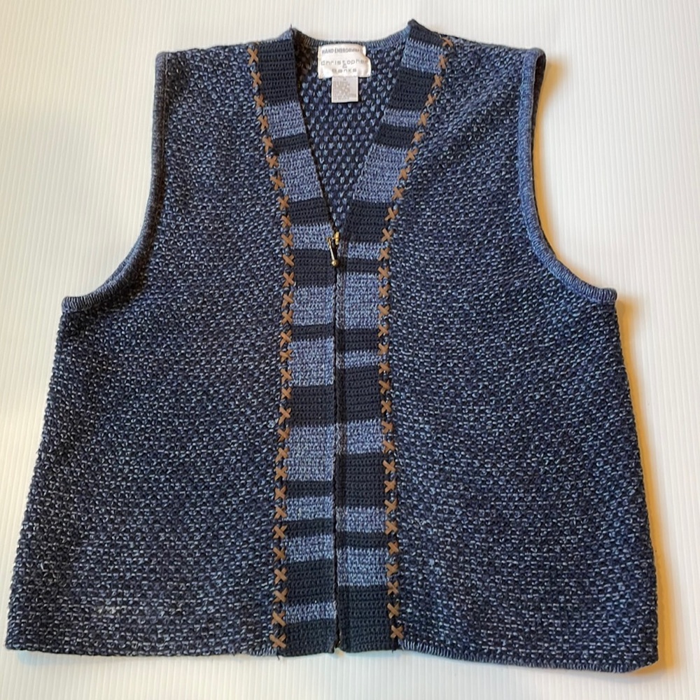 Christopher & Banks blue vest with leather detailing.  Women’s size medium